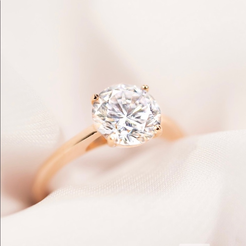 Rose gold solitaire engagement ring